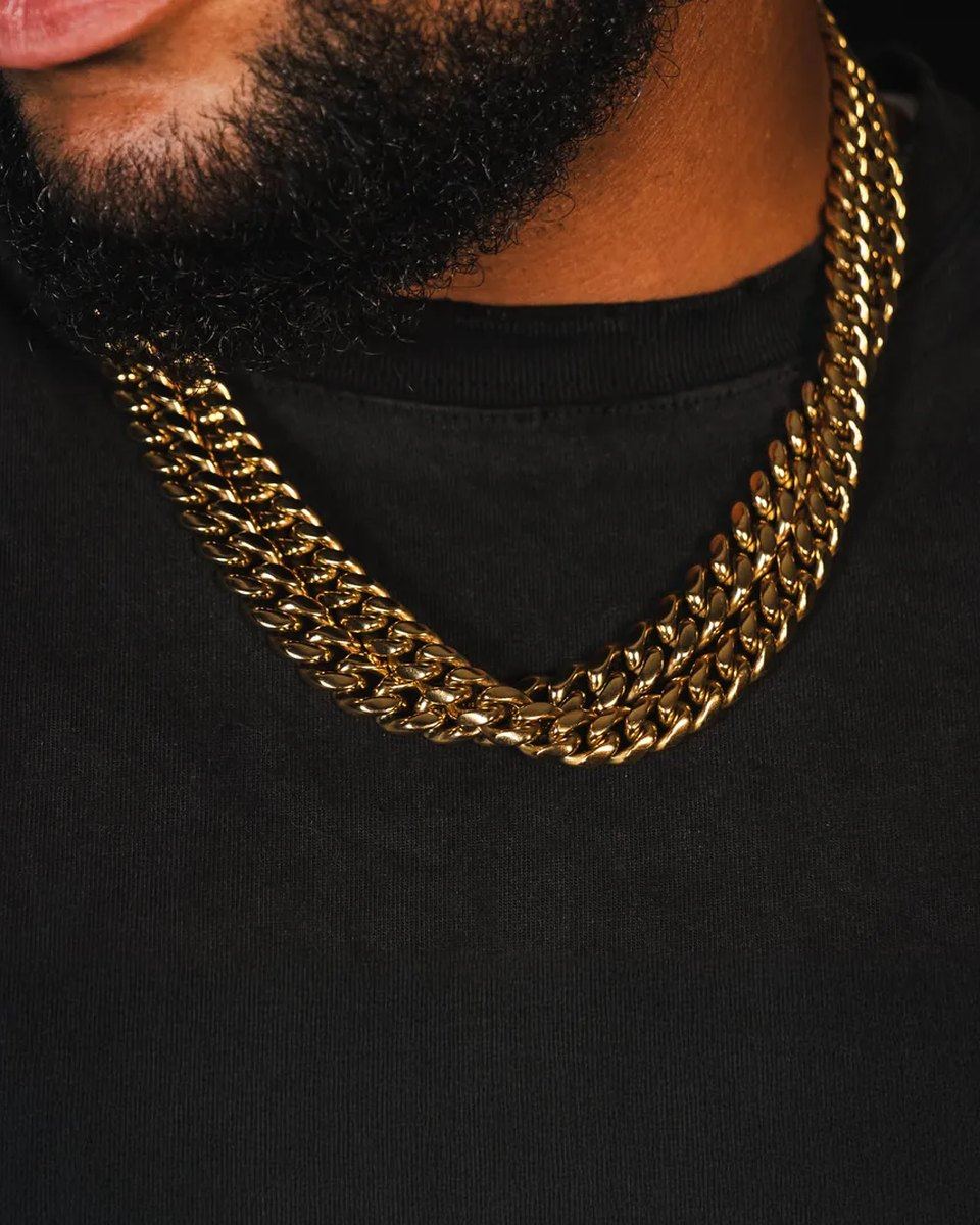 Two 12mm Classic chains stacked, worn over a black tee