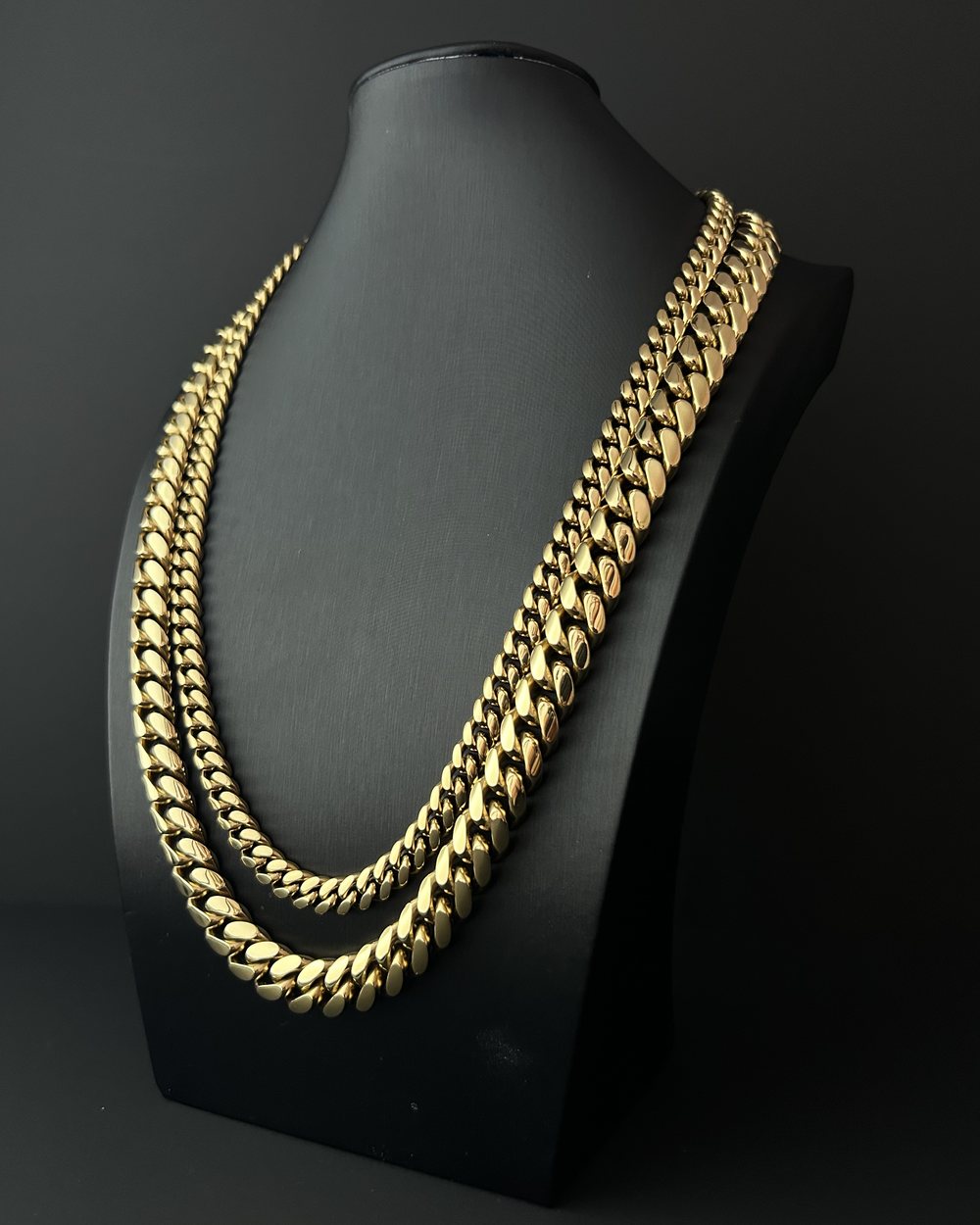 The 8mm and the 12mm Cuban link worn together on the same display bust