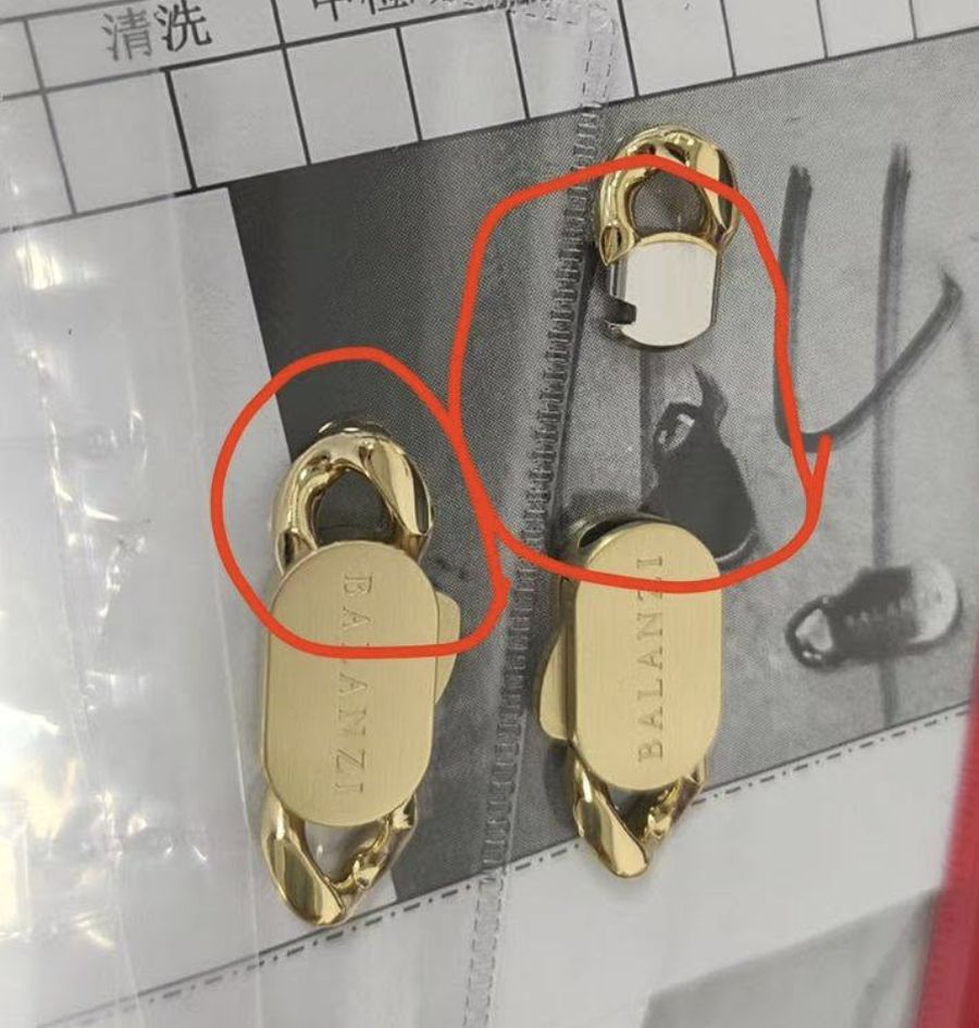 Two gold BALANZI clasps circled in red marker on a factory inspection sheet, showing uneven plating